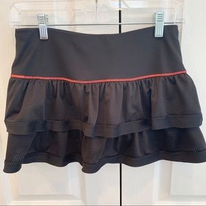 Lucky In Love tennis skirt (12”). Black. Size XS
